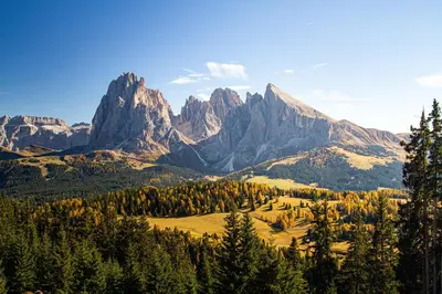 a view of a mountain range with trees and mountains at La Maison 35 - Bruneck - zentral gelegene Appartments in Brunico
