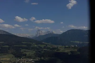 a view of a valley with mountains and trees at Historic Alpine Lodge In The Heart Of South Tyrol in Villandro