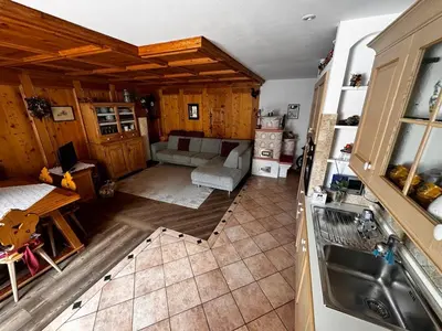 an aerial view of a kitchen and living room at Appartamento Town Center in Predazzo