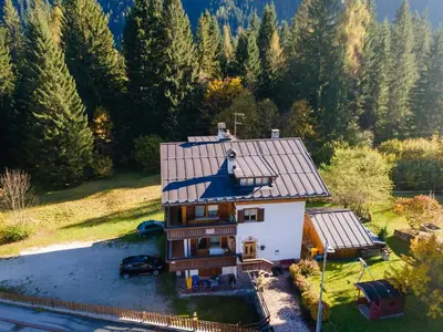 an aerial view of a house in the woods at Casa Sangi in Caviola