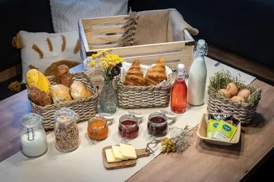 a table with baskets of bread and eggs on it at Niederhof - Urlaub auf dem Bauernhof in Brixen