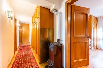 a hallway with a heater in a house at Villa Diana in Cortina dʼAmpezzo