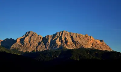 a mountain with a blue sky in the background at Chi Plans in Antermoia