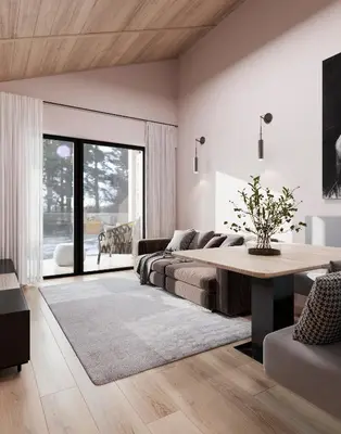 a living room with a bed and a table at Mountain Chalet Costes in San Cassiano