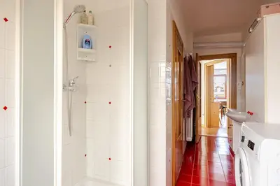 a bathroom with a shower and a sink at Casa dei Vessi il cuore di Fondo in Fondo