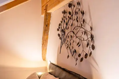 a bunk bed in a room with a ladder at Un Sogno Tra Le Dolomiti in Frena