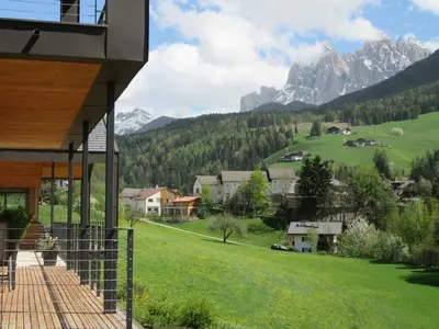 a house with a view of a mountain at Peterwieshof in Funes