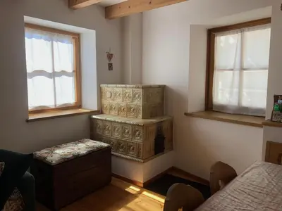 a room with two stacks of boxes in it at Ca' Stella in Castello di Fiemme