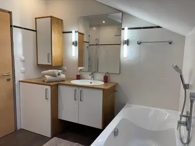 a hallway of a kitchen with a sink and a counter at Hanselerhof in Val di Mezzo