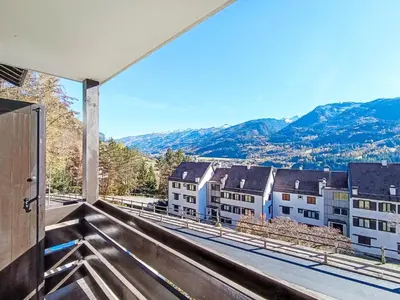 a view of a town from the balcony of a house at Apartment Val Fiemme by Interhome in Cavalese