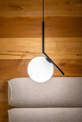 a white computer mouse sitting on top of a table at Cademai Alpenglow Chalet with Sauna R&R in Cortina dʼAmpezzo