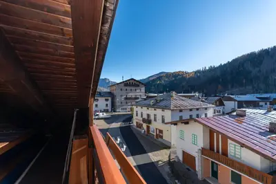 a view from a balcony of a town with buildings at Casa Paola in Rocca Pietore
