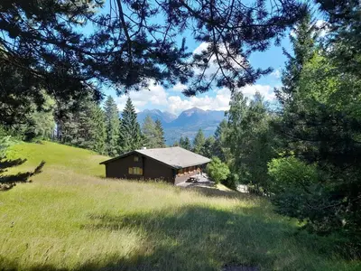 a small cabin on a hill in a field at Monoloclae-Prati di Solaiolo in Solaiolo