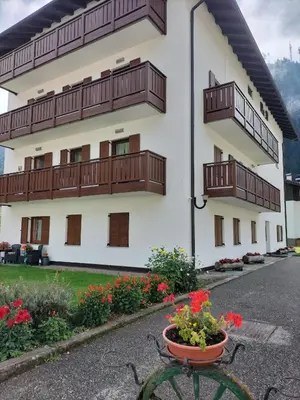 a building with balconies on the side of it at Appartamento l'angelo in Predazzo