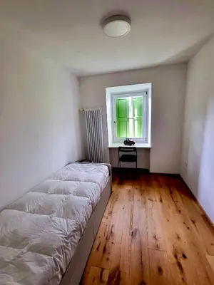 a living room with a couch and a table at Casa Diletta in Prade