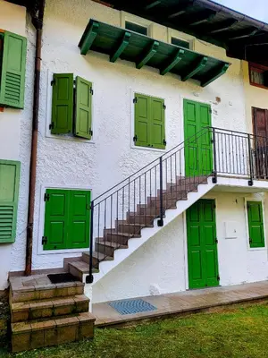 an open door to a balcony with a view at Casa Diletta in Prade