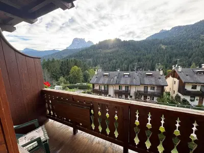 a balcony with a view of a mountain at Mansarda Ca Geranei in San Vito di Cadore