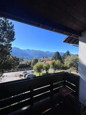 a balcony with a view of a parking lot at Chez Mati by Sunhome Fiemme in Cavalese
