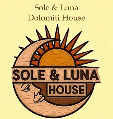 a logo for a sale and limbo house at Sole & Luna Dolomiti House in Voltago