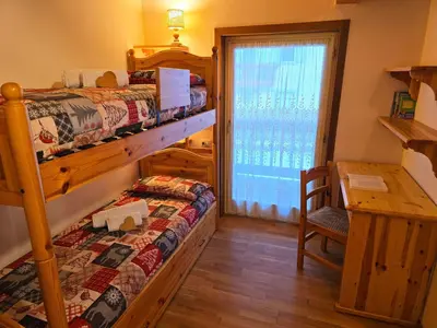 a bathroom with a tub and a sink and a toilet at Attico Lagorai - Alpine Stay Apartments in Ziano di Fiemme