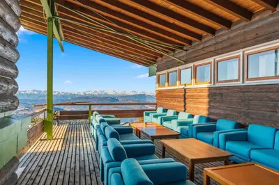 an empty sauna with wooden benches in it at Eurotel Cermis in Cavalese