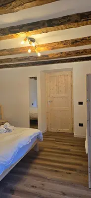 a bathroom with a sink and a mirror at Rifugio Kristine in Falcade