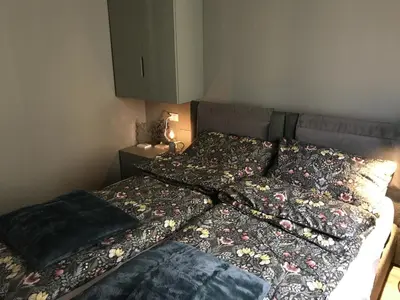 a bed in a room with two pillows on it at Masiere - La Chicca in Masarè