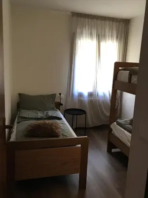 a bedroom with a bed and a window at Masiere - La Chicca in Masarè