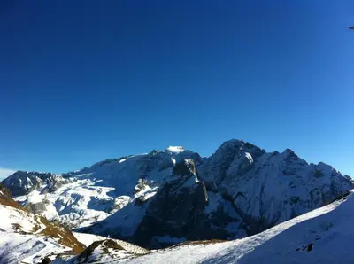 a view of a snow covered mountain at Appartamento Ivo in Campitello di Fassa
