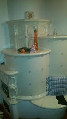a shelf on top of a toilet in a room at Appartamento Ivo in Campitello di Fassa