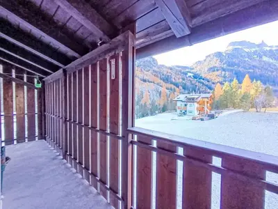 a view from a balcony with a mountain view at Apartment Genziana-5 by Interhome in Penia