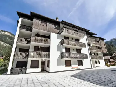 a building with balconies on the side of it at Apartment Des Alpes-19 by Interhome in Campitello di Fassa