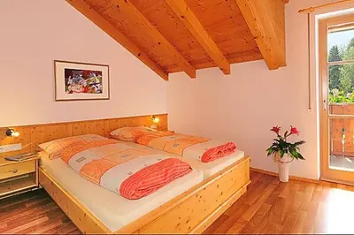 a bedroom with two beds in a room at Apartment Walder in Fiumes