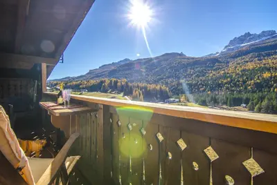 a view from a balcony with a view of a mountain at La tua mansada in montagna - Comfort e vista in Cortina dʼAmpezzo