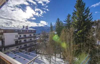 a view from the balcony of a building at Nel cuore di Cortina comodo appartamento con parcheggio in Cortina dʼAmpezzo