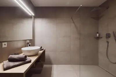 a bathroom with a sink and a shower at Apartments Knappenhof Pfitsch - with Swimming Pool in Val di Vizze