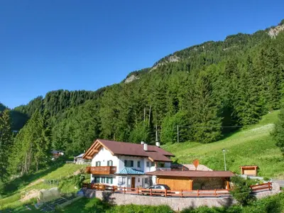 a house in the middle of a mountain at Apartment Cesa Vedla DOLOMITES by Interhome in Bulla