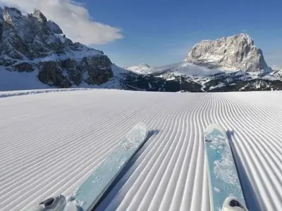 two skis in the snow in front of a mountain at Apartment Cesa Vedla DOLOMITES by Interhome in Bulla
