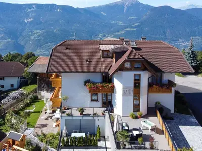a house with a view of the mountains at Apartment Wohnung Mölten by Interhome in Meltina