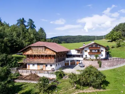 a large house in the middle of a field at Apartment in Seis by Interhome in Siusi