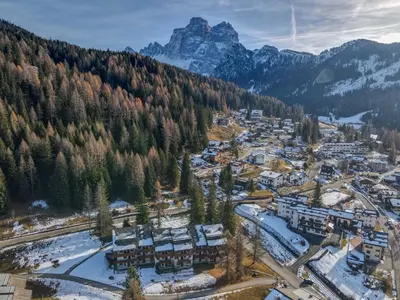 an aerial view of a resort town in the mountains at Petit Cirsio in Santa Fosca
