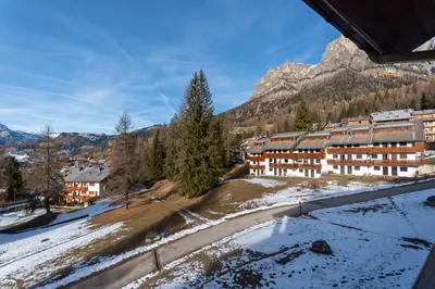 a resort in the mountains with snow on the ground at Petit Cirsio in Santa Fosca