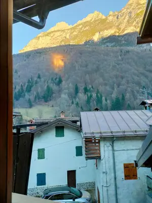 a view of a mountain from a window of a house at appartamento Casa Lucia in Cencenighe