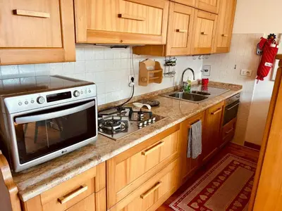 a kitchen with a microwave and a sink at Ca' San Lorenzo in Villanova