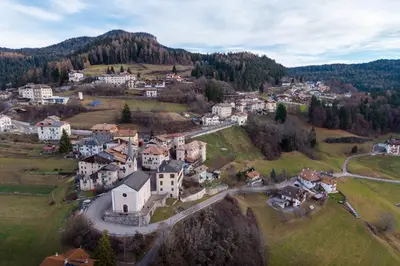an aerial view of a small town on a hill at Casa Rita Brenta - Ruffrè-Mendola in Ronzone