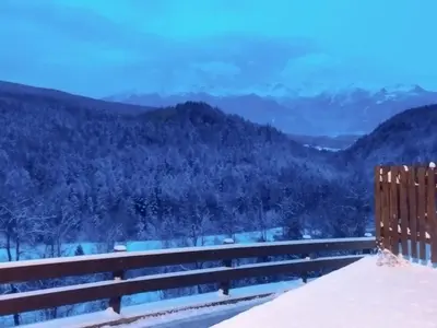 a view of the mountains in the snow at Casa Rita Brenta - Ruffrè-Mendola in Ronzone