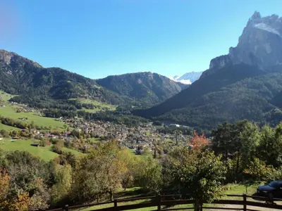 a town in a valley with mountains in the background at Apartment mit traumhaftem Ausblick by Interhome in Siusi