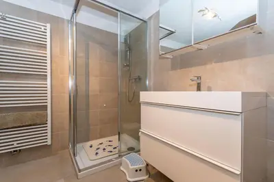 a bathroom with a shower and a sink at Ciasa al Caselo in Falcade
