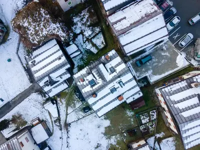 an overhead view of a parking lot with snow at Ciasa al Caselo in Falcade