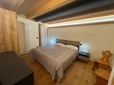 a bathroom with a toilet and a sink and a shower at Casa PAOLINA OLIMPIC 2026 in San Vito di Cadore